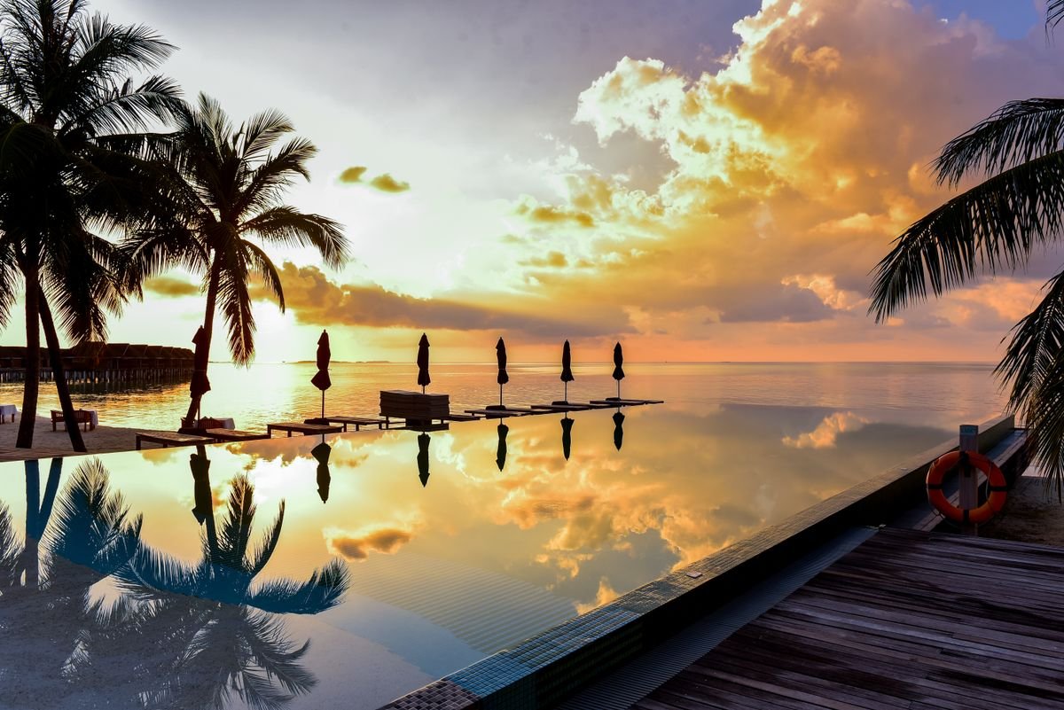 Private villa terrace at dusk — The Sanctuary